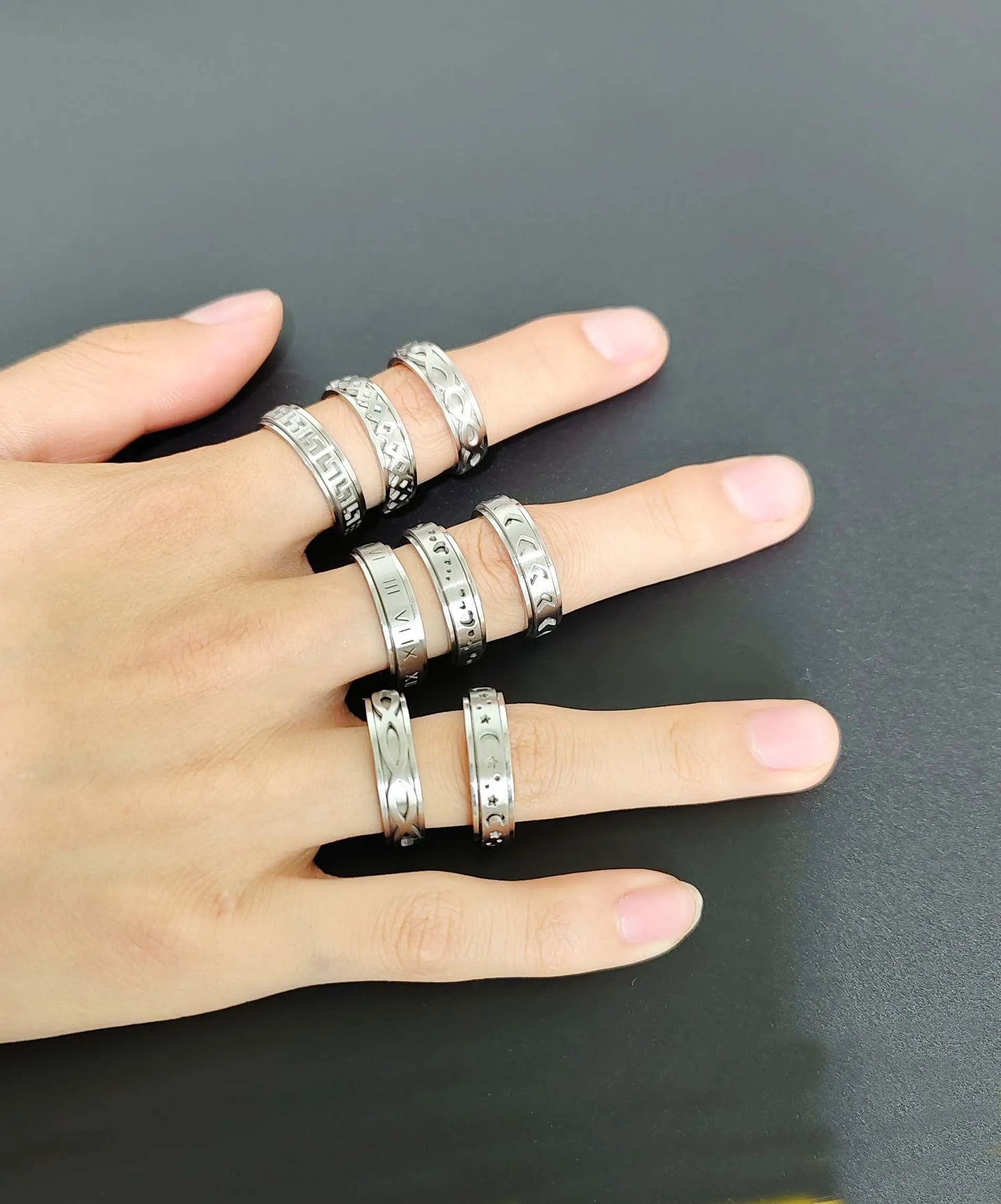 8-piece fashionable design stainless steel rotating men's decompression and anti anxiety ring set.