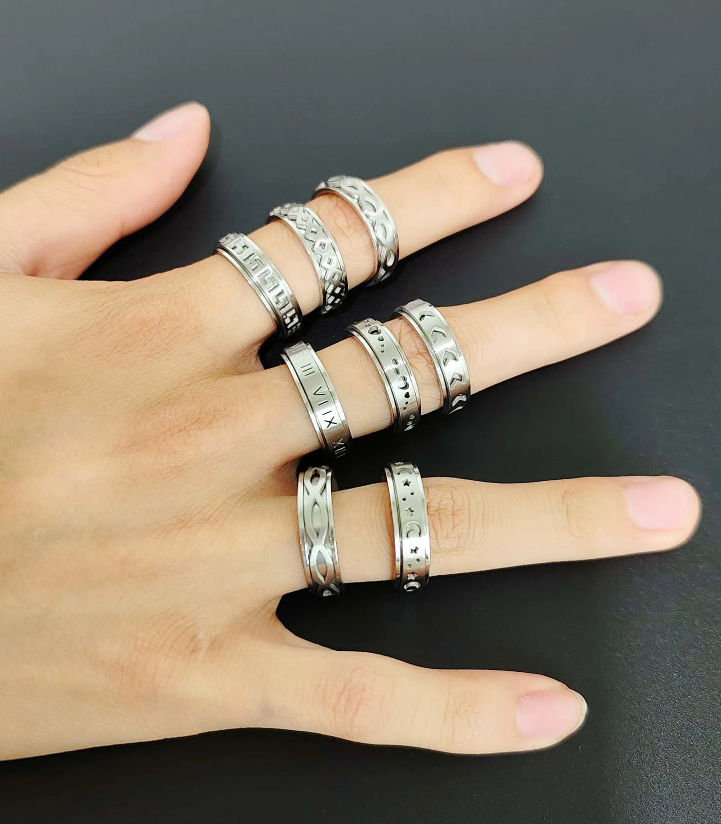 8-piece fashionable design stainless steel rotating men's decompression and anti anxiety ring set.